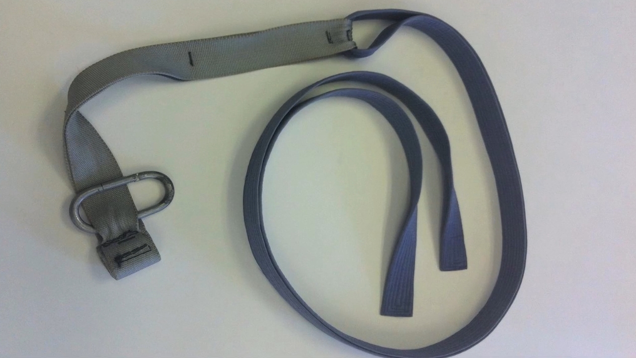 Original TRX prototype made with nylon straps and a metal carabiner.